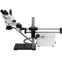 AmScope SM-5TZZ-FOR Professional Trinocular Stereo Zoom Microscope, WH10x and WH20x Eyepieces, 3.5X-180X Magnification, 0.7X-4.5X Zoom Objective, Fiber-Optic Ring Light, Ball-Bearing Double-Arm Boom Stand, 110V-120V, Includes 0.5X and 2.0X Barlow Lenses