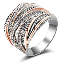 Mytys 2 Tone Women's Rings Intertwined Crossover Statement Rings Rose Gold and Silver Plated