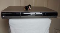 Toshiba D-R5 DVR/DVD Video Recorder. DVD-RAM/DVD-R/DVD-RW Recording. 1080i/720p/480 Upconverting w/ HDMI, Progressive Scan, DIVX, Dolby Digital Recording, Compact Disc Digital Audio. REMOTE INCLUDED.