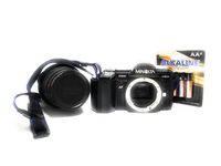 Minolta Maxxum 7000 Autofocus SLR 35mm Film camera with Minolta AF 35-70mm Lens in Working condition and Strap