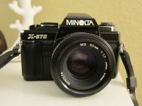 Minolta X-570 SLR Camera With A 50mm f/1.7 Lens