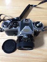 Nikon FE SLR Chrome 35MM Film Camera Kit with Lens.