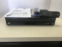 JVC HR-XVC11B DVD/VCR Video Cassette Recorder / DVD Player COMBO. 4-Head Hi-Fi Stereo VHS/CD/Video CD/DVD Player. Dolby Digital Sound. Energy Star Rated. AV Cable Included. No Remote.
