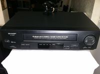 Sharp VC-H810 VCR Video Cassette Recorder 4-Head Hi-Fi Stereo VHS Player. VHS HQ. Sharp Super Picture. Works Great. Energy Saver Star Rated Device.