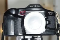 Minolta Maxxum AF 9xi SLR camera body with customized lens
